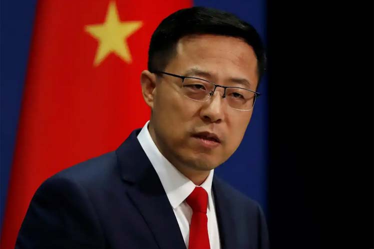 China exige respeto al sistema democrático de Venezuela